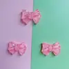 Accesorios de resina al por mayor, accesorios de bricolaje, material hecho a mano, hebilla de zapato, parche de sombrero, crema, pegamento, línea, lazo transparente
