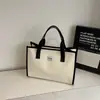 Bolsa Xadrez Casual de Grande Capacidade 2025 Nova Bolsa Tote para Estudante e Comutador Bolsa Transversal Casual com Textura Contrastante