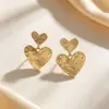 Pendientes europeos y americanos de corazón plisado transfronterizos, pendientes de corazón simétricos personalizados vintage desgastados, pendientes de corazón de melocotón estilo Hong Kong
