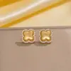 Pendientes de Trébol de Cuatro Hojas con Incrustaciones de Circonita Estilo Xiaohongshu para Mujer, Diseño de Lujo Ligero, Pendientes de Aro Completamente Diamantados