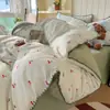 Conjunto de cama de quatro peças em gaze dupla, modelo novo 2026, lavável à máquina, lençol e capa de edredom com bordado de concha jacquard de ponto triangular, conjunto de três peças