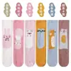 Calcetines largos antideslizantes suaves y amigables con la piel para otoño e invierno, calcetines de felpa de dibujos animados lindos para dormir, calcetines versátiles de media pantorrilla gruesos para niños