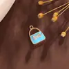 Bolso Nuevo de Estilo de Moda Versátil Colgante de Lazo con Diamantes Microincrustados Colgante Pequeño Pulsera Colgante de Collar Joyería