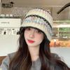 Otoño e invierno nuevo color gorro de pescador de punto a rayas cálido con protección para las orejas moda coreana versátil gorro de cubo de lana
