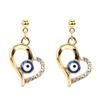 Pendientes de ojo de diablo nuevos, pendientes de ojos azules de diamantes, pendientes de aleación de amor Joker al por mayor, venta al por mayor, transfronterizos de Europa y Estados Unidos