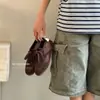 Versión de cuero de las zapatillas de entrenamiento retro alemanas clásicas para mujer, con diseño de cordones, punta redonda, suela plana, zapatillas casuales