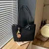 Moda Feminina Nova Outono 2026 Transfronteiriça Bolsa de Mão Grande Capacidade Bolsa de Ombro para o Dia a Dia Casual Vintage Versátil Bolsa Tote