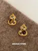Aguja de Plata 925 Nuevo Estilo Chino Old Money Ojo de Tigre Fortuna Calabaza Pendientes para Mujer Hueco Circonita Viaje