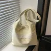 Bolsa de Lona Casual para o Dia a Dia 2026 Primavera Nova Elegante Bolsa de Ombro Estrela Moda Coreana Personalizada Bolsa de Axila