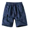 Nuevos pantalones cortos casuales deportivos de verano de talla europea para hombre, moda holgada con bolsillo, ropa de trabajo moderna