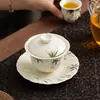 Juego de Gaiwan de Pared Delgada con Flores de Cerezo Pintadas a Mano de Tres Piezas Set de Té Gongfu de Porcelana Blanca Lanolina Uso Individual en Casa Herramienta para Preparar Té de Alto Valor Estético