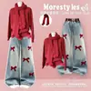 Conjunto de dos piezas de suéter para niña otoño e invierno nuevo estilo atuendo de niña Año Nuevo suéter de punto rojo conjunto de jeans con lazo