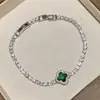 Pulseira de cristal flor de quatro pétalas para comércio exterior transfronteiriço, versão coreana, luxo leve, design de alta qualidade, acessório de mão floral estilo ins