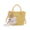 Bolsa transversal de ombro único com laço doce estilo coreano para mulheres, design de nicho, bolsa de mão de cor sólida, mochila moderna e versátil