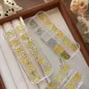 12 Compartimentos Clavo con Remache de Estrella Joyería para Uñas Mini Corte Mixto Estrella de Cinco Puntas Bola de Acero Diamante de Uña Aleación Accesorios Venta al por Mayor