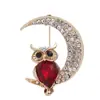 Europa y Estados Unidos nuevo broche de perlas vintage corsage incrustaciones de diamantes de imitación pin de búho accesorios para ropa joyería al por mayor
