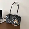 Nuevo bolso coreano de moda estilo lunares tipo baguette, a la moda y elegante, popular bolso de hombro y para llevar debajo del brazo para el trabajo, principios de otoño 2026