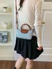 Bolso de mano de lunares a la moda, bolso de hombro de nicho con correa de cierre para mujer, moderno, elegante, fresco, casual, bandolera versátil para debajo del brazo