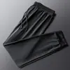 Pantalones deportivos de verano para hombre, de malla fina de seda helada, de secado rápido, elásticos, holgados, informales, transpirables, con aire acondicionado, talla grande