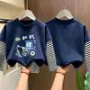 Camiseta de manga larga para niño 2026 nuevo modelo, camiseta básica de dibujos animados para niño, camiseta interior de algodón puro a rayas para otoño, estilo primavera y otoño