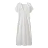 Comercio exterior al por mayor ropa de mujer 2026 otoño nuevo diseño de moda jacquard con flecos vestido largo de cuello en V