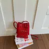 Moda de Verano 2026 Bolso Pequeño Tejido Hueco Bolso Cruzado de Hombro Mini de Cuero Suave Bolso para Teléfono Móvil