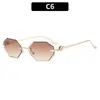 Gafas de sol sin montura de corte irregular estilo coreano de moda con un toque de alta gama, gafas versátiles y modernas de estilo urbano, modelo nuevo para mujer