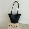 Bolso de cubo de nicho transfronterizo para mujer, nuevo bolso de mano versátil de moda 2026 con patrón de lichi, bolso de hombro cruzado