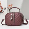 Bolsa Redonda Pequeña de Mano con Borlas Diseño de Bordado de Hilo de Rombos Bolsa de Hombro Bolso Cruzado Simple Fuente de Fábrica de Comercio Exterior Transfronterizo