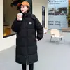 Tiro real 2026 nueva chaqueta de algodón retro abrigo de algodón para mujer de longitud media estilo coreano holgada ins estilo Hong Kong chaqueta acolchada de algodón abrigo engrosado