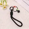 Lanyard de pentagrama con cascabel estilo deportivo moderno, accesorio versátil para bolsos, muñecas y fundas de teléfono, venta al por mayor