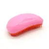 Venta al por mayor de fábrica peine de masaje mango de plástico peine para el cabello en forma de coma fácil de llevar sin enredos color peine TT