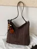 Bolso de axila retro de alta gama para mujer, nuevo bolso de hombro tipo cubo versátil de moda de verano para el día a día