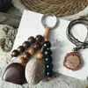 Nuevo colgante de bolsa de cuentas de semillas que cumple deseos estilo chino, llavero de Bodhi natural tejido a mano, decoración artística retro para bolsa