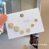 Pendientes pequeños de una semana, populares pendientes pequeños de aguja de plata S925, una tarjeta, tres pares de pendientes de combinación de traje, pendientes de circonita roja de red para mujer
