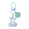 Colgante llavero de oso de resina color caramelo DIY accesorio de regalo cultural y creativo para bolsos, fundas de auriculares y decoraciones