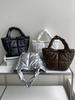 Bolso de plumas de estilo coreano de moda para otoño e invierno, diseño de nicho, bolso de mano de alta gama para mujer, ligero y simple, bolsa para ropa de algodón