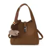 Bolso Cubo Sencillo de Mano Estilo Coreano para Mujer 2026 Nuevo Modelo Invierno Bolso de Hombro Cruzado Minimalista Elegante de Alta Calidad