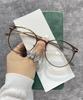 Vasos de té cálido miopía mujeres se pueden equipar con gafas de montura redonda sencilla ultraligeras anti-luz azul estilo coreano cara pequeña