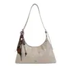 Bolso de axila para mujer, nueva colección de verano 2026, moderno, de alta gama, ligero, retro, a la moda y adecuado para ir al trabajo; se puede llevar como bolso de hombro o bolso cruzado