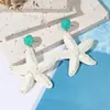 Pendientes de Estrella de Mar de Rafia Trenzada Dopamina Estilo Pendientes de Vacaciones de Verano en la Costa Accesorios de Nicho de Gama Alta de Principios de Primavera