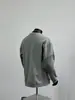 Sudadera de cuello redondo con empalme y manga larga, estilo americano moderno, marca nueva de otoño 2025, suéter sencillo casual gris para hombre
