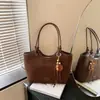 Bolso tote para mujer, nueva colección otoño/invierno 2026, elegante y versátil, con un toque de alta gama, gran capacidad, adecuado para ir al trabajo y diseñado como bolso de axila o bolso de hombro