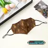 Mascarilla de Seda Hilo Xiangyun Cuatro Estaciones Estampada Doble Capa Esquina del Ojo Correa para la Oreja Ajustable Protección Facial Estilo Occidental de Alta Gama