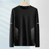 Camiseta de manga larga para hombre, adecuada para primavera y otoño, corte holgado, cuello redondo, capa interior fina, base elástica, versátil y moderna