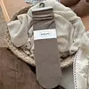 Novas meias cinza de algodão sem costura para outono e inverno, com cores da série Maillard, meias lisas de cano médio para mulheres