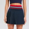 Falda plisada de línea A estilo preppy retro de verano Falda deportiva anti-exposición que cubre la cadera Forro de falda deportiva para tenis