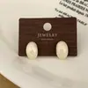 Verano Fresco Dulce Temperamento Moda Simple Sensación de Alta Gama Esmalte Pendientes de Gota Lujo Ligero Sensación de Alta Gama Pendientes de Nicho para Mujeres