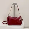 Moda Otoño 2026 Color Sólido Cuero Brillante Casual Simple Gran Capacidad Bolso de Hombro Cruzado Bolso de Mano Bolso de Axila