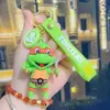 Terceira Geração Tartarugas Ninja Desenho Animado Chaveiro Pingente de Casal Celebridade da Internet Boneca Exquisita Chaveiro Pingente de Bolsa Venda por Atacado